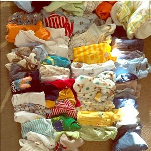 Box of newborn to three months old baby clothes
